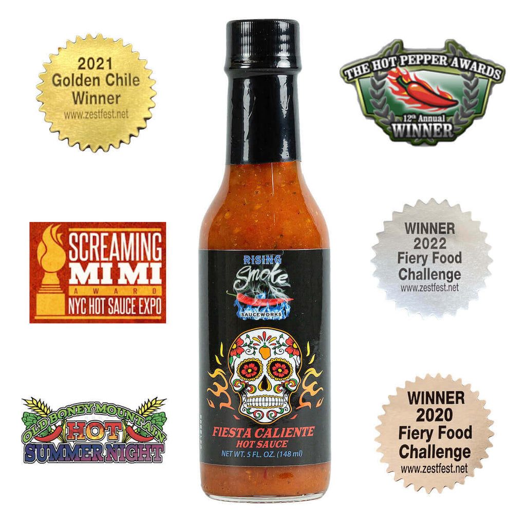 Fiesta Caliente.  Hot smoked habanero taco sauce.  Award winning.  All natural.  Gluten Free.  Vegan.  Mexican Inspired