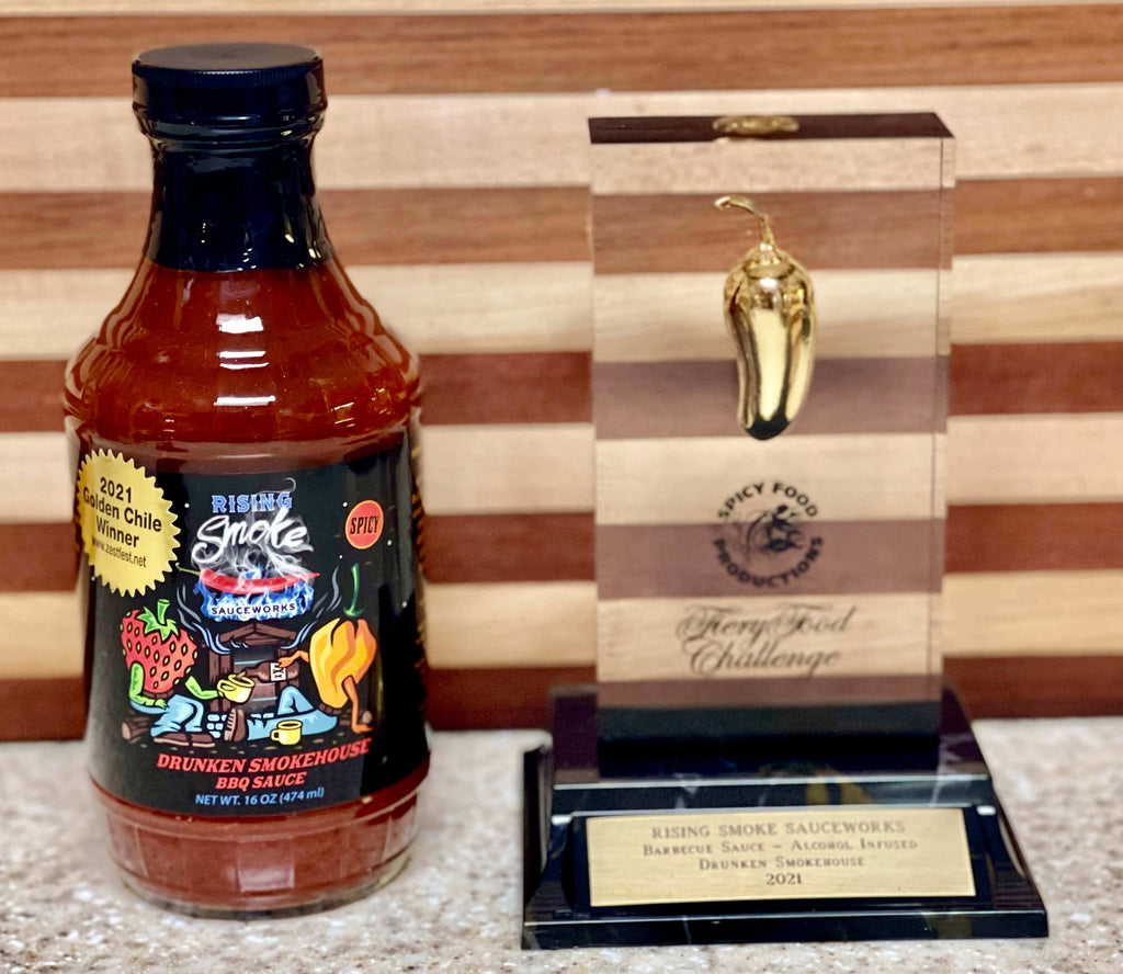 Rising Smoke Sauceworks Drunken Smokehouse BBQ Sauce.  Strawberry, bourbon and smoked habaneros.  Award winning.  All Natural.  Gluten Free.