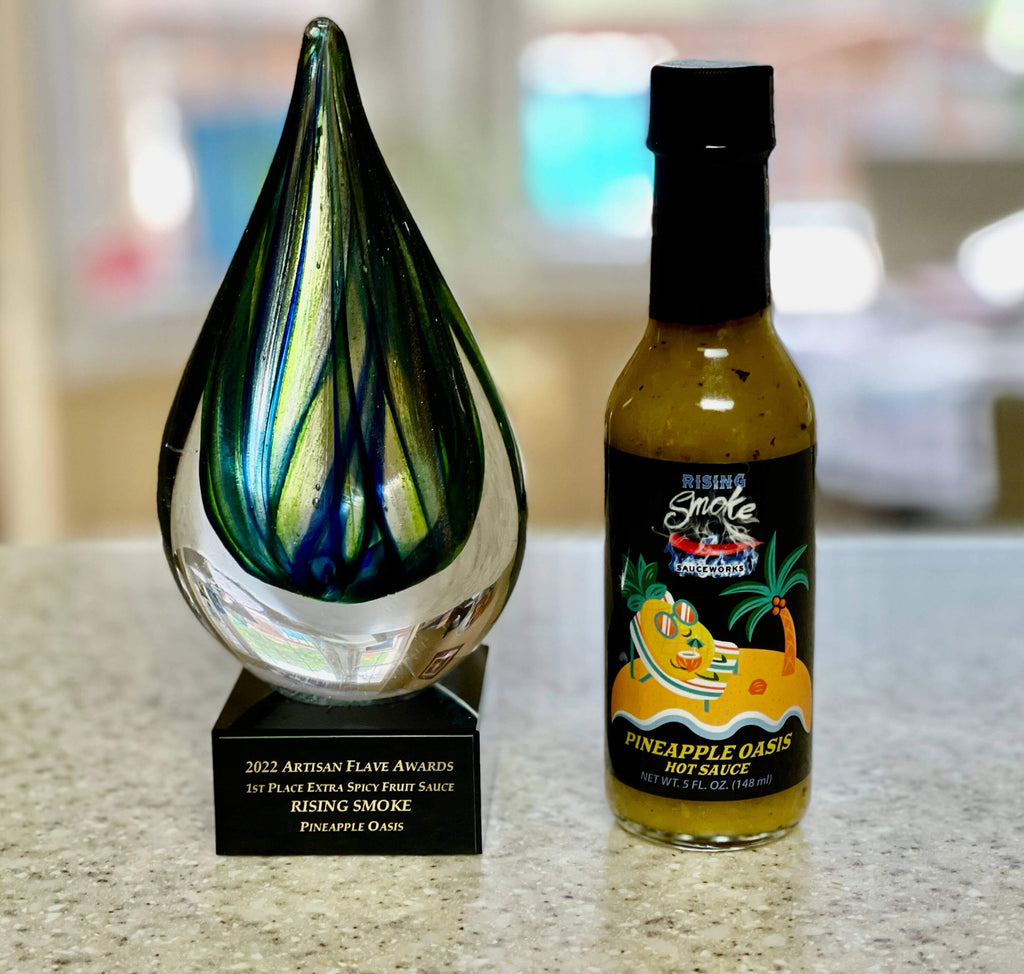 Pineapple Oasis hot sauce.  Pineapple, roasted bell pepper, ginger.  All natural.  Gluten free.  Award winning.