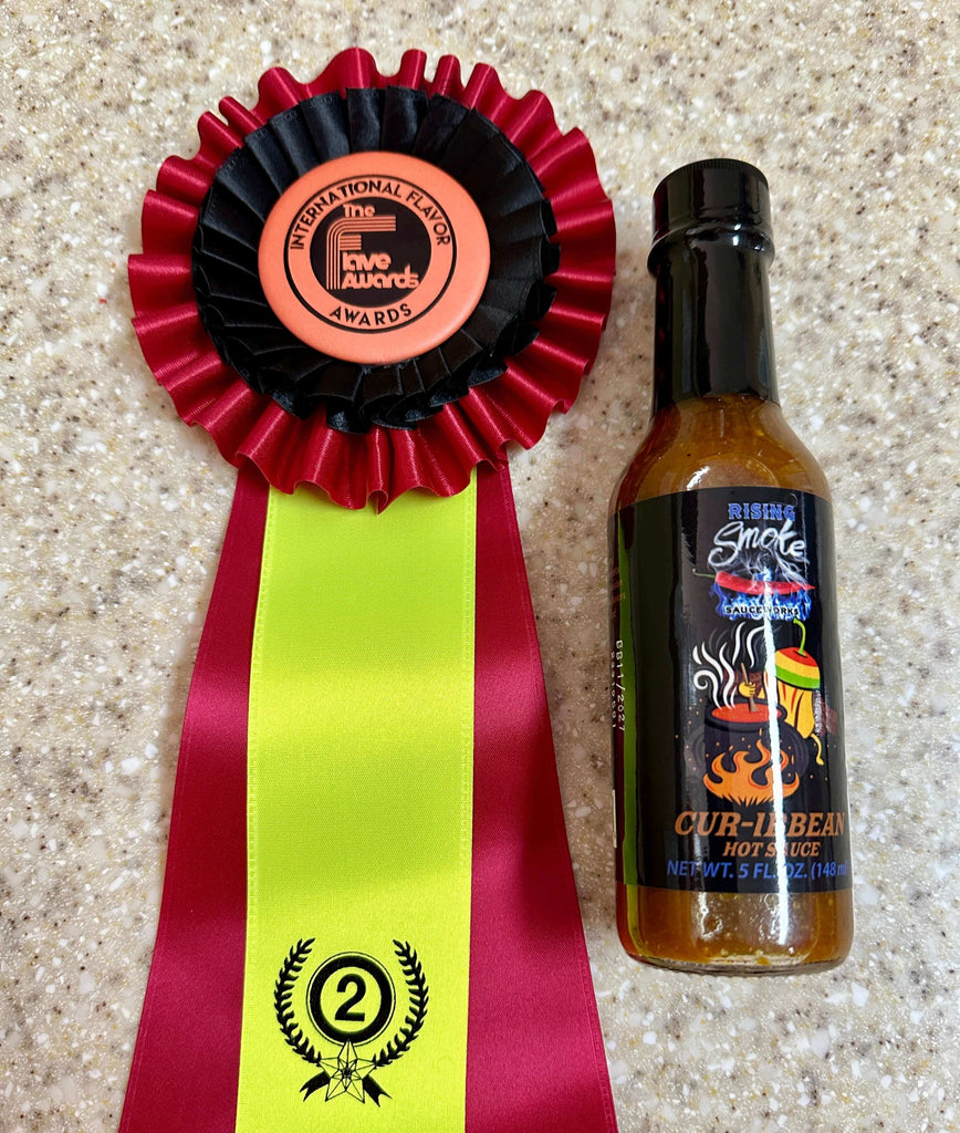 Cur-ibbean Hot Sauce Award Winning fusion.  Part curry, part Caribbean jerk.  All natural.  Gluten Free.