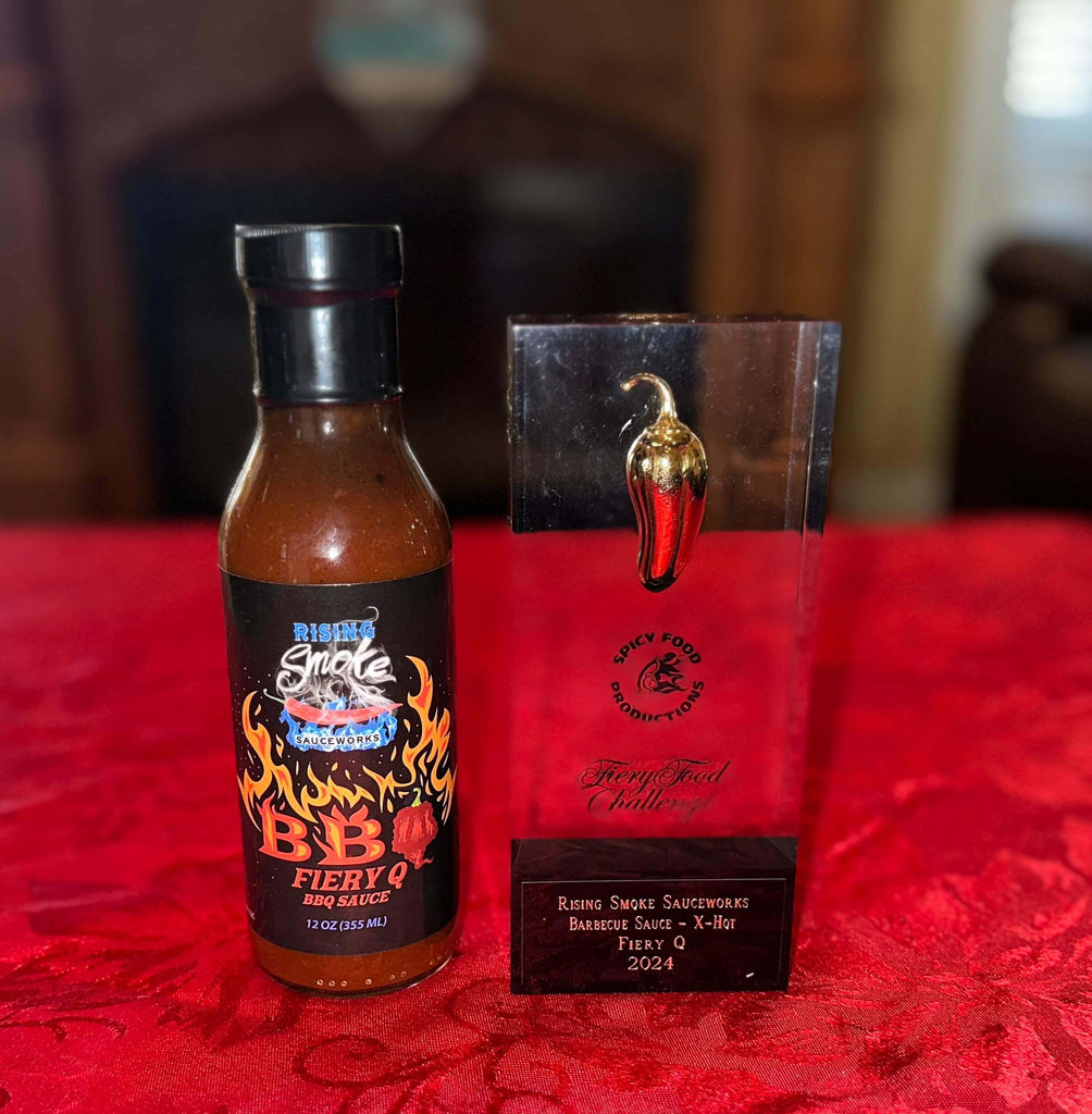 Fiery Q Award Winning Xhot BBQ Sauce.  Blackberries and smoked Carolina reapers.  All natural.  Gluten free.  