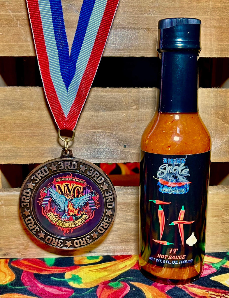 It, cayenne garlic award winning hot sauce.  All natural.  Gluten free.  Vegan.  