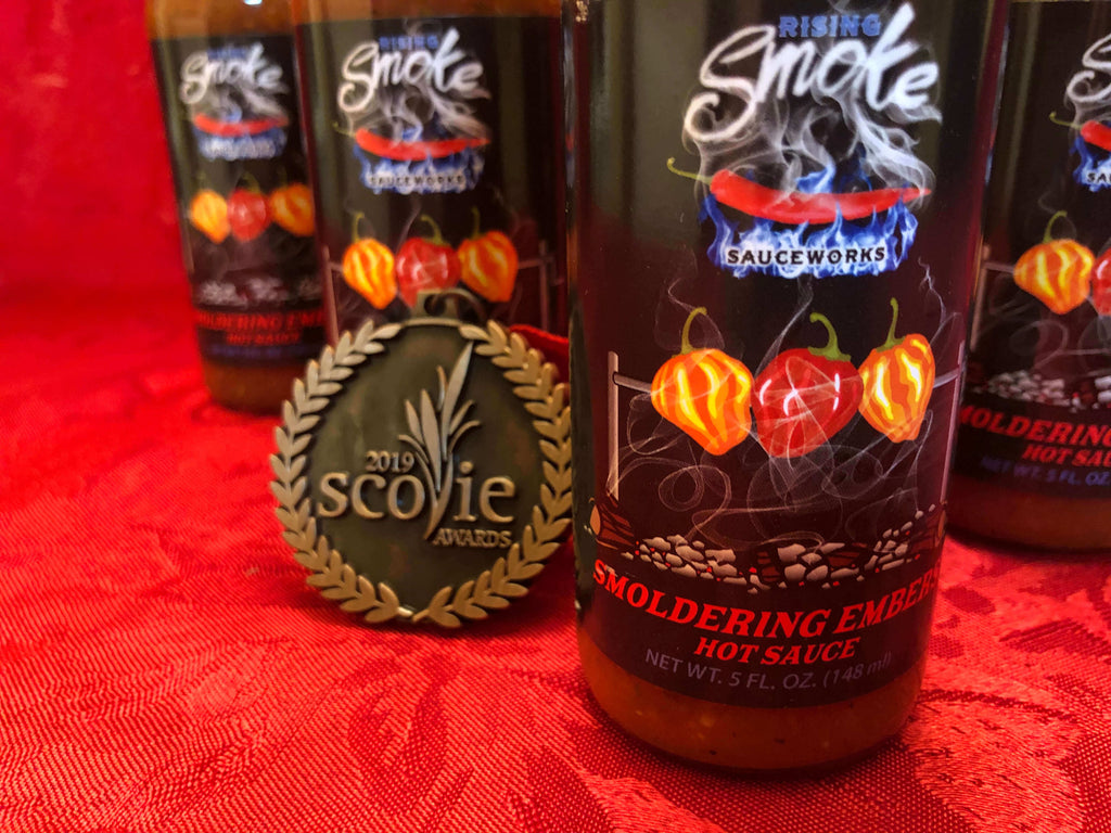 Smoldering Embers Smoked Habanero, tomato and basil hot sauce.  Award winning, gluten free, vegan, all natural.