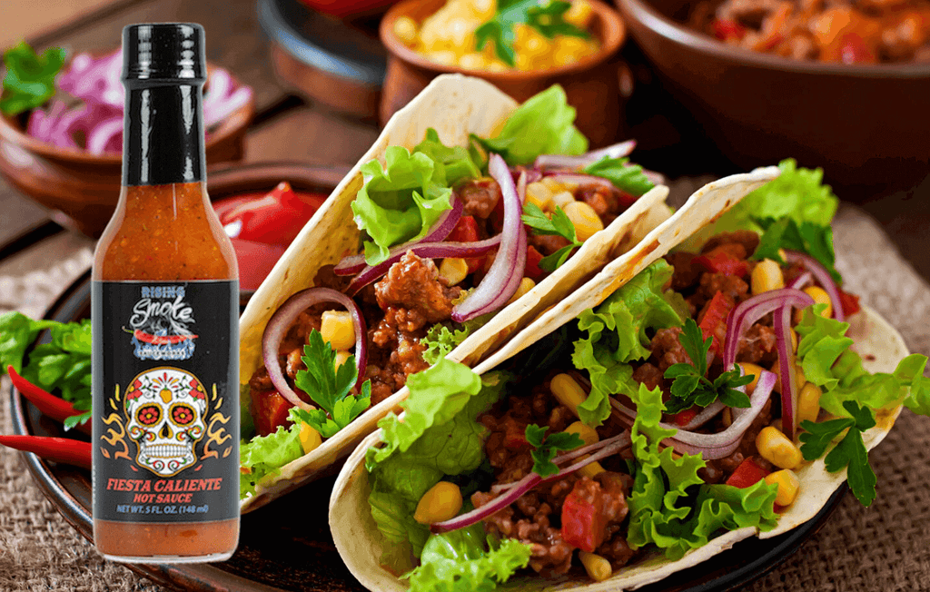 Fiesta Caliente hot sauce.  Hot taco flavored sauce.  All Natural.  Award winning.  Gluten Free.  Vegan.