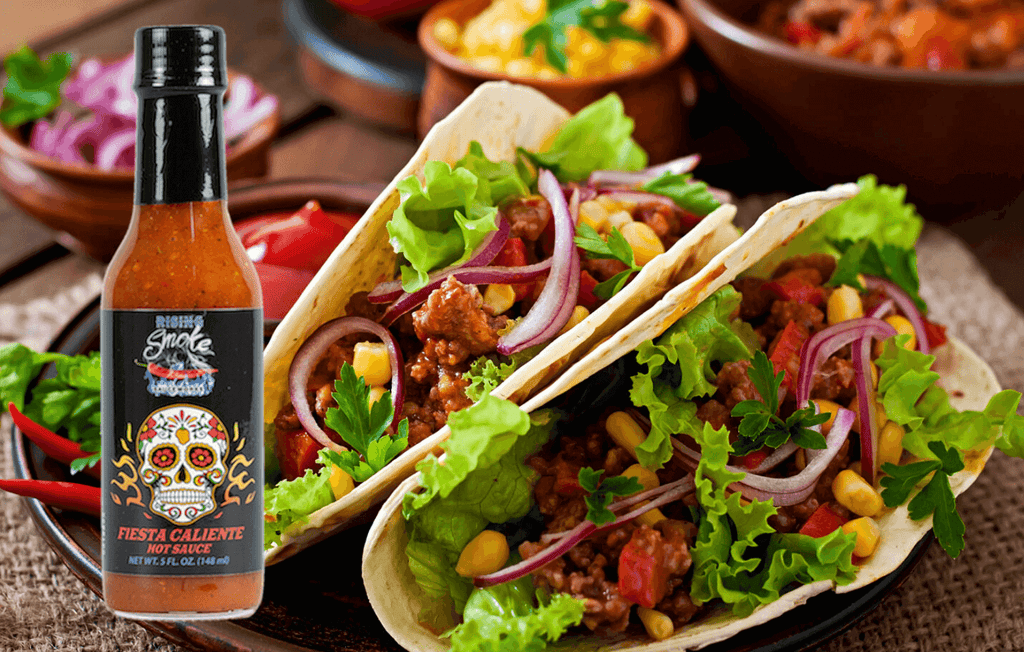 Fiesta Caliente.  Hot smoked habanero taco sauce.  Award winning.  All natural.  Gluten Free.  Vegan.